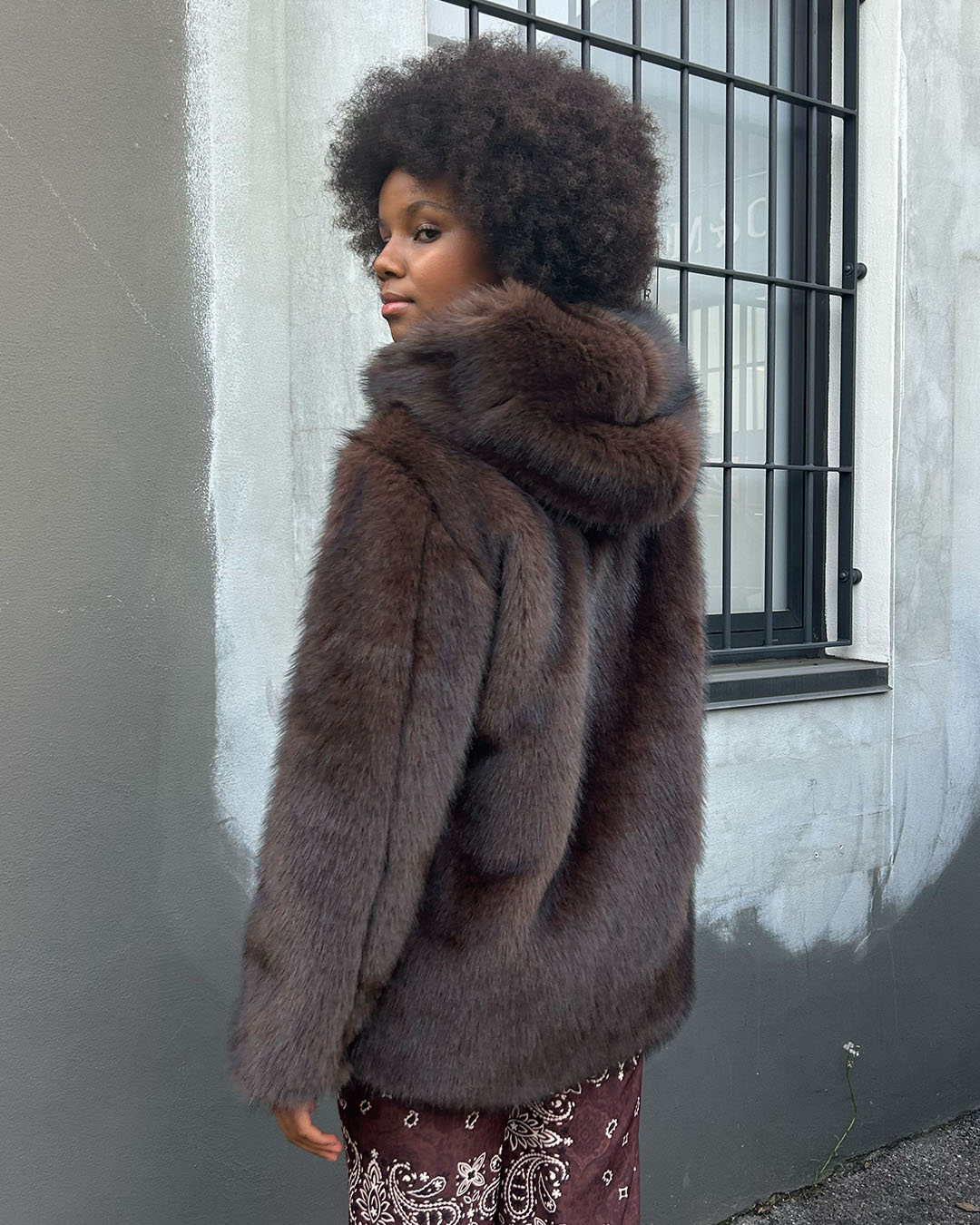 Pelliccia con cappuccio