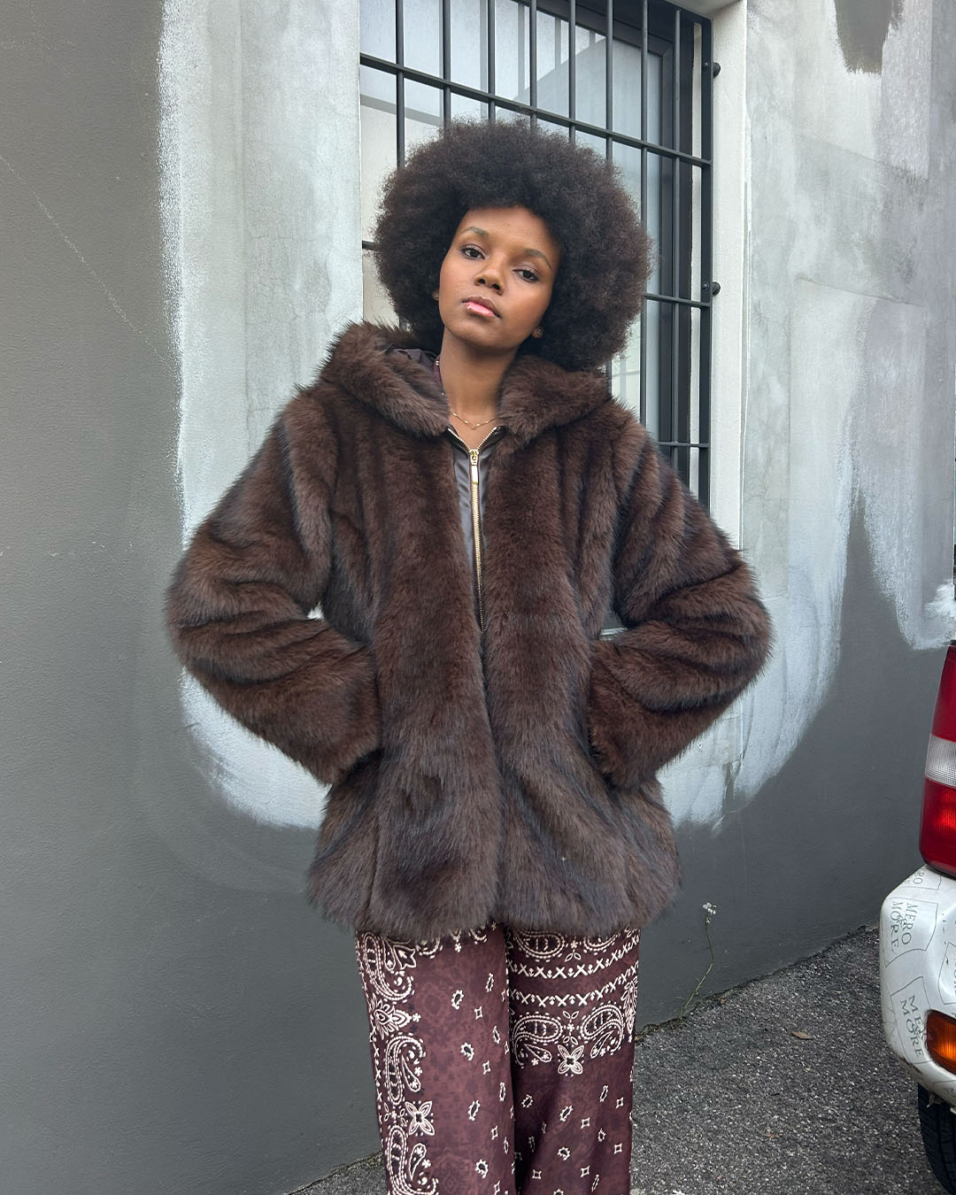 Pelliccia con cappuccio